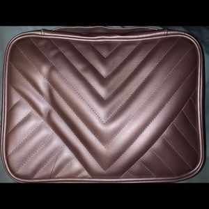 Rose gold makeup bag